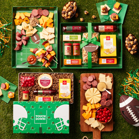 Game Day Entertaining Gift Set and Touchdown Treats Gift Box on grass background